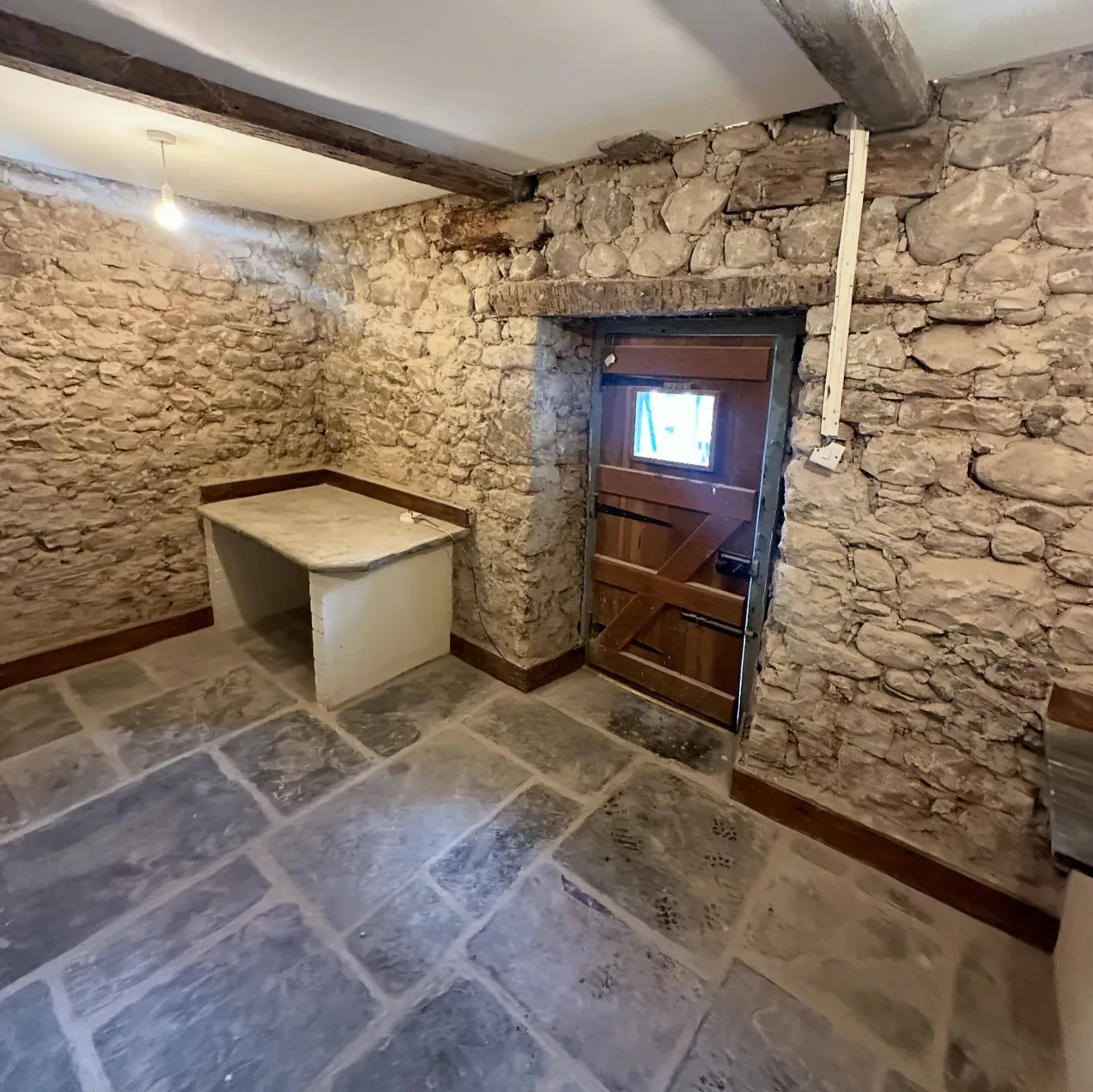 Window seat in a deep stone wall