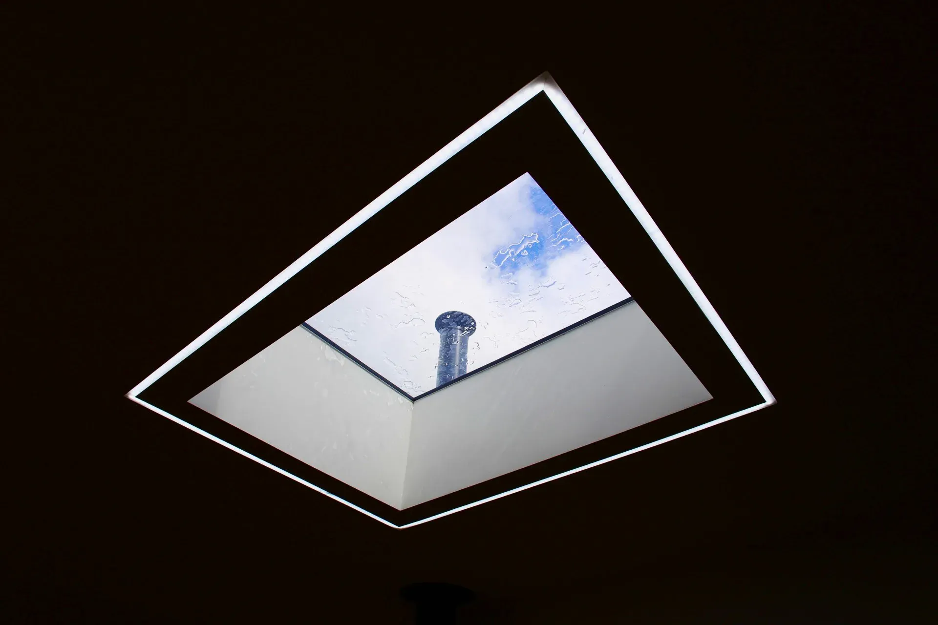 Rooflight with a lit surround, seen from below
